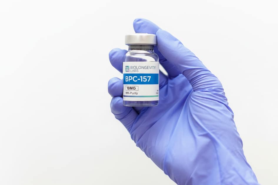 lab tech vial | 5 Reasons BioLongevity Labs is a Top Research Peptide Company in the USA